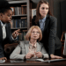 Senior attorneys reviewing online search performance together, illustrating how law firm SEO supports visibility, trust, and client decision-making in modern legal practices.